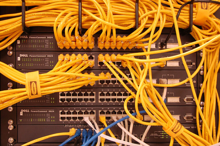 Server rack with network cables representing residential proxy network infrastructure