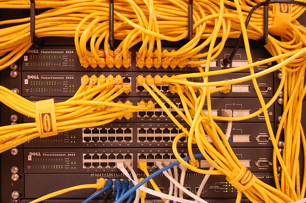 Server rack with network cables representing residential proxy network infrastructure